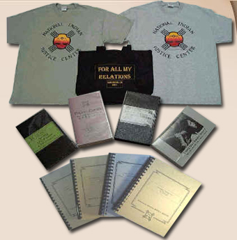 Photo of NIJC merchandise: t-shirts, books, tote bag